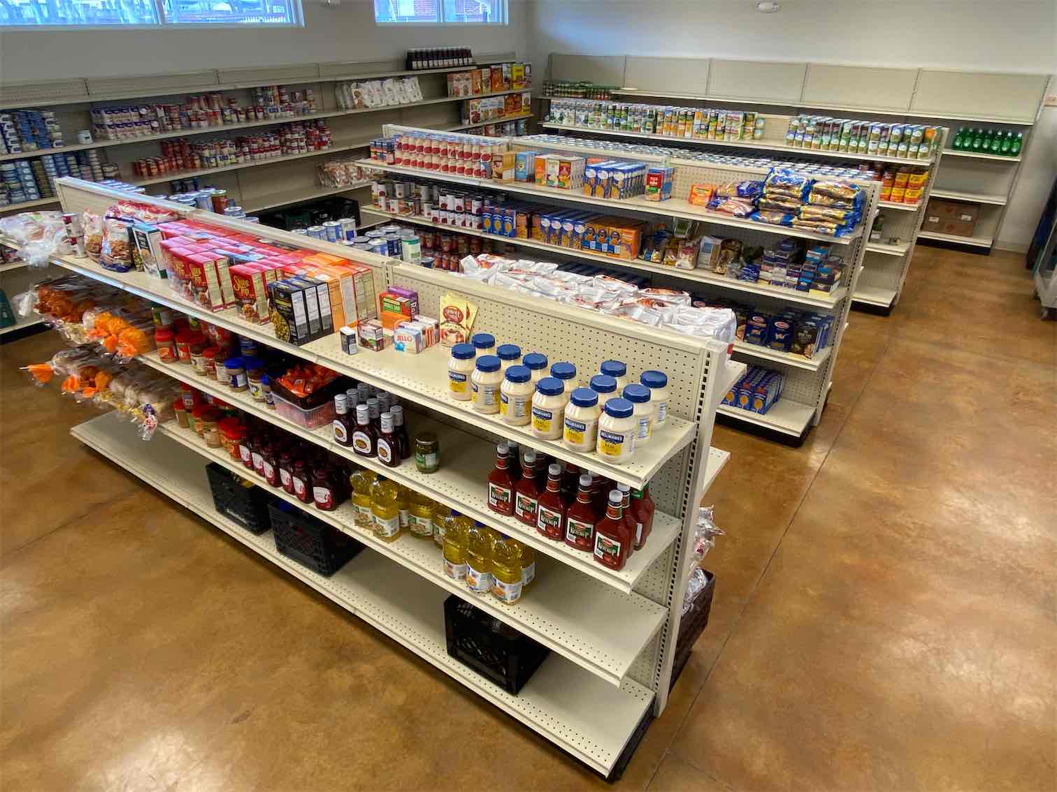 Shelves of groceries for clients to choose from.